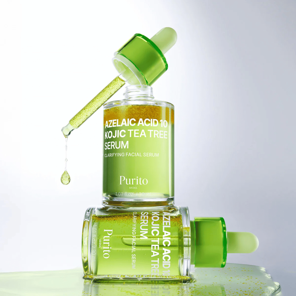 Purito Azelaic Acid 10 Kojic Tea Tree Serum – formule verte fraîche avec goutte de pipette montrant la texture légère du sérum.