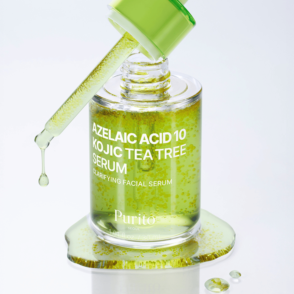 Gros plan sur Purito Azelaic Acid 10 Kojic Tea Tree Serum avec pipette et gouttes. Rend la peau plus claire et réduit les impuretés.