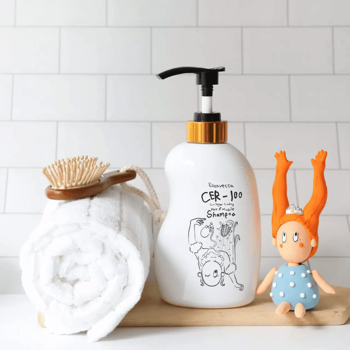 Elizavecca CER-100 Collagen Coating Hair A+ Muscle Shampoo – shampoo au collagène fortifiant pour cheveux secs et abîmés en milieu de salle de bain