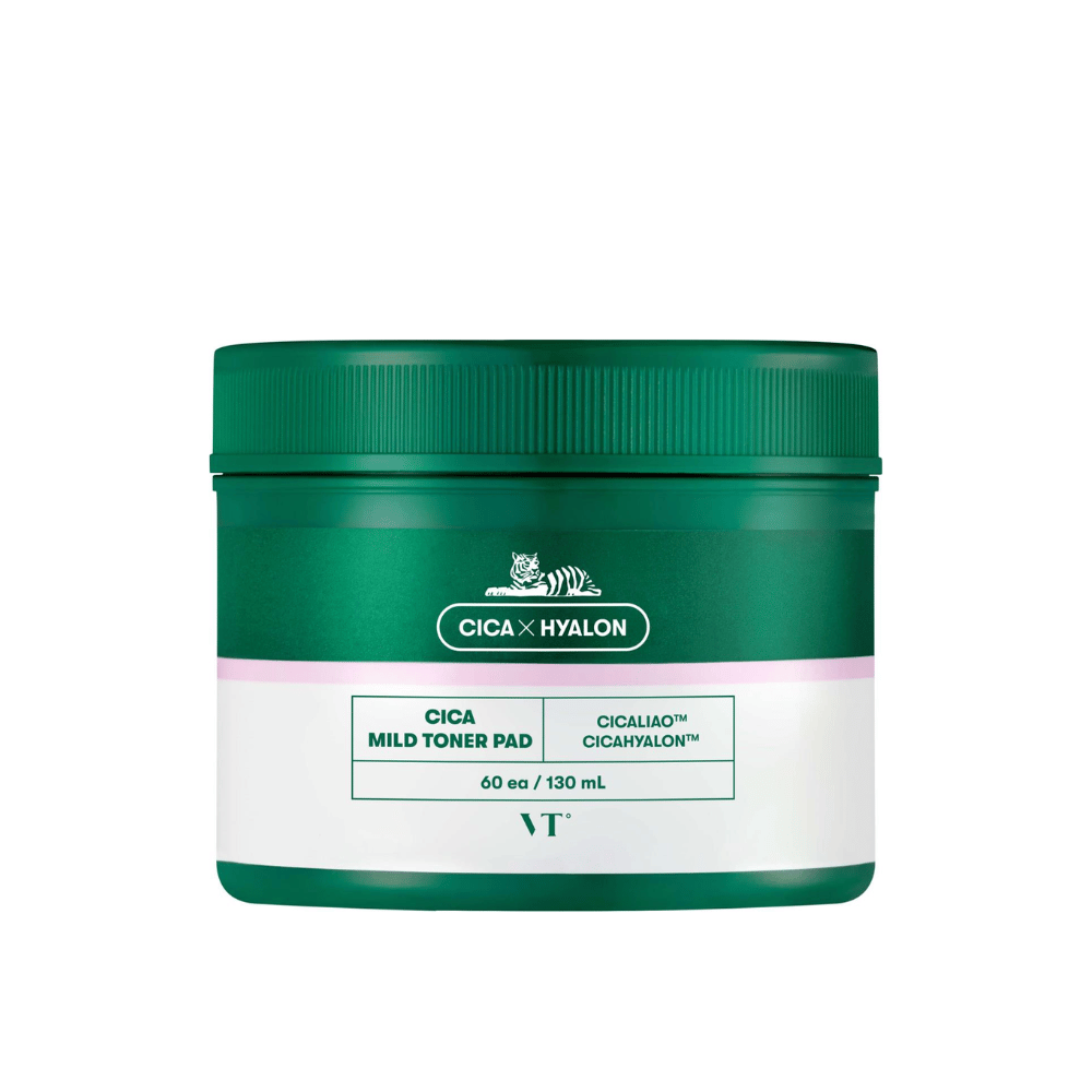 Grön burk med VT Cica Mild Toner Pad, 60 st pads/130 ml, med vit och rosa etikett samt tigerlogotyp mot vit bakgrund.