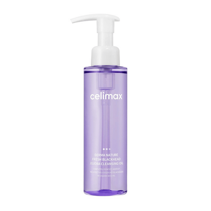 Flaska av Celimax Derma Nature Fresh Blackhead Jojoba Cleansing Oil i genomskinlig lila förpackning med vit pump, mot vit bakgrund.