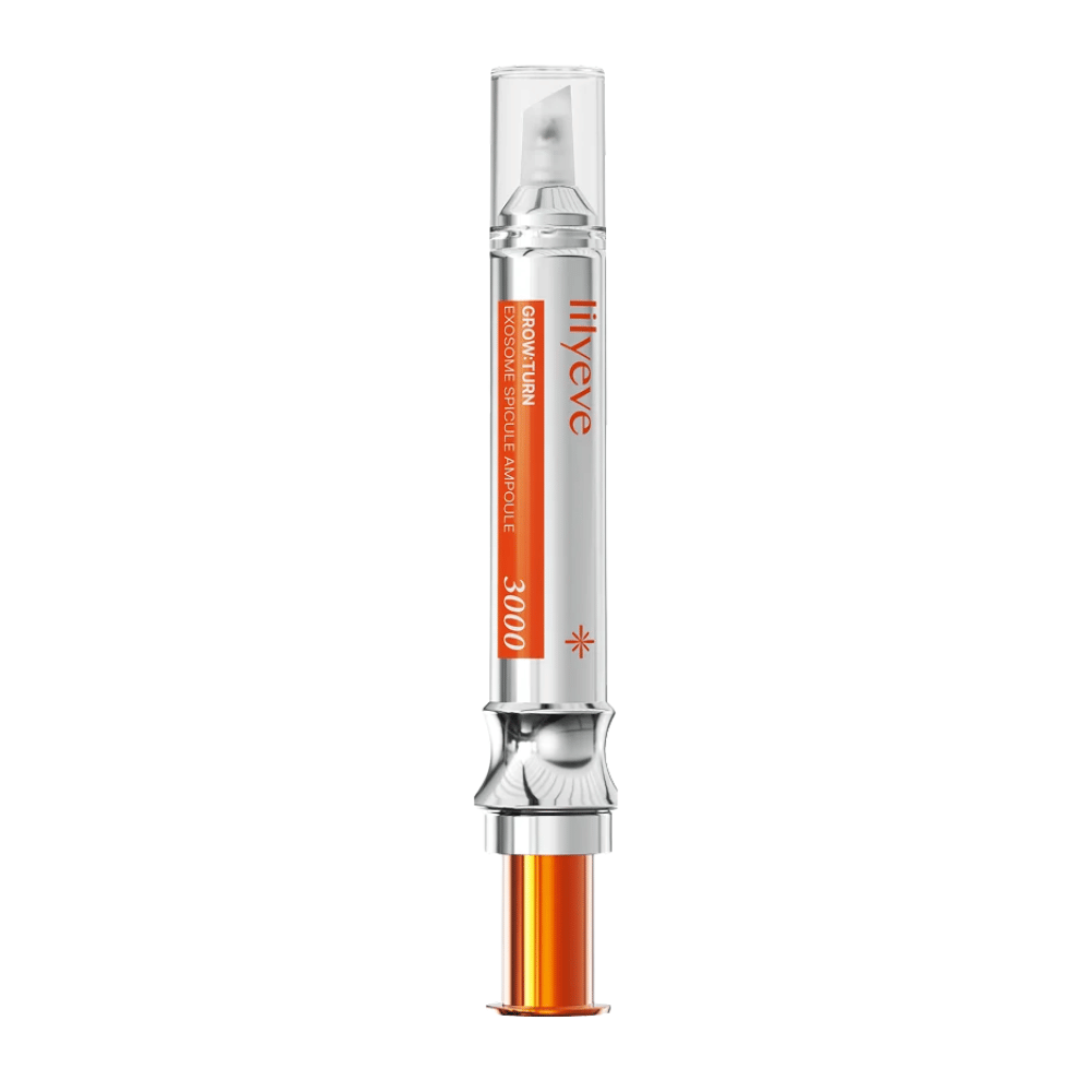LILYEVE Grow Turn Exosome Spicule Ampoule 3000 – ampoule pour le cuir chevelu avec applicateur de précision dans un emballage argenté et orange.