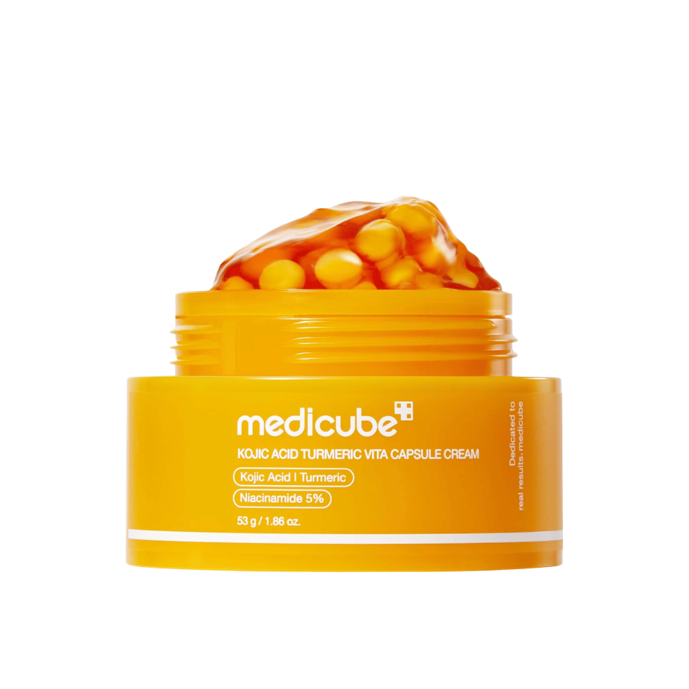5. Medicube Kojic Acid Turmeric Vita Capsule Cream 53 g – pot jaune de gel-crème et capsules sur fond blanc