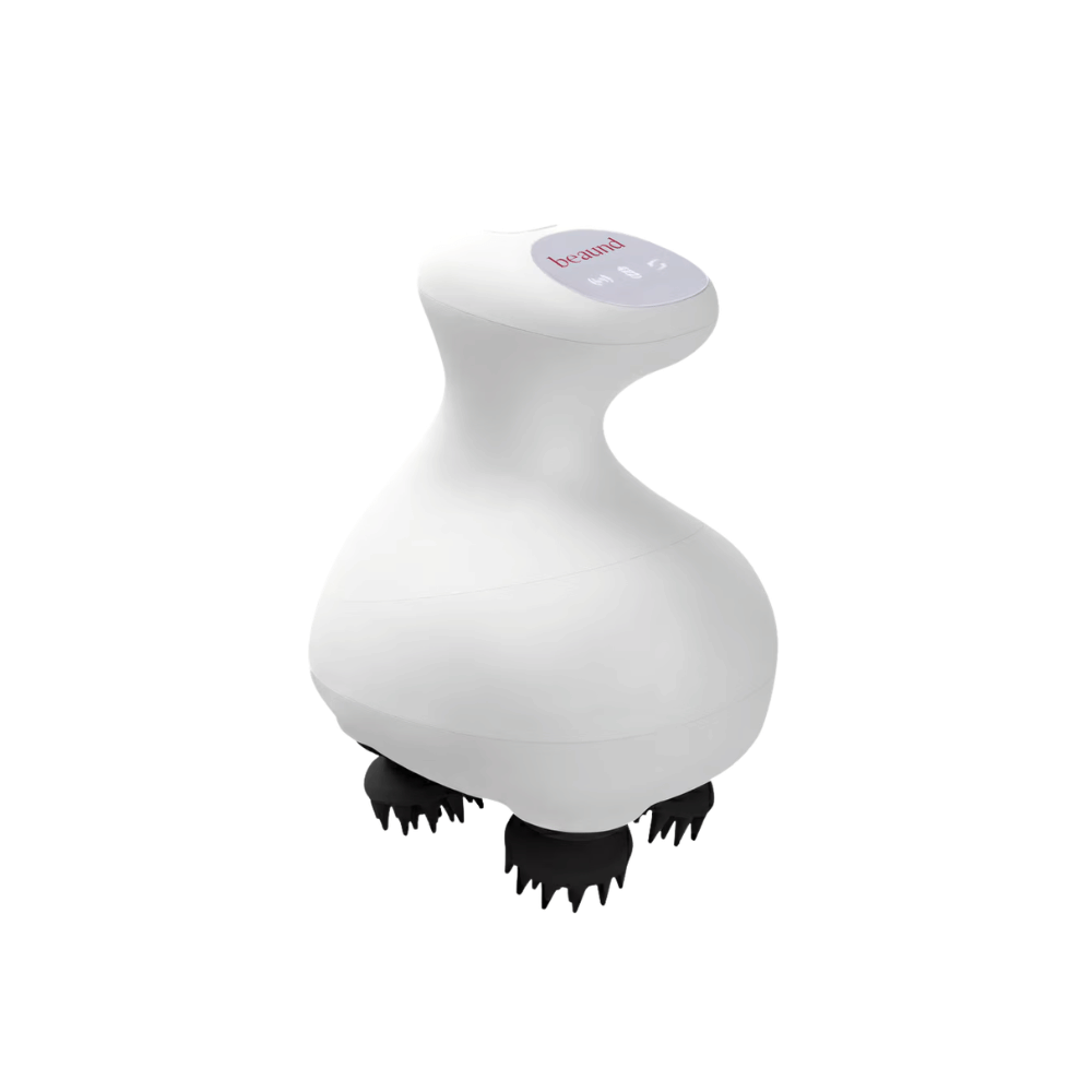 Beaund Lift Head Spa en cours d’utilisation sur le cuir chevelu. L’image montre comment les têtes de massage rotatives agissent près des racines pour un massage du cuir chevelu relaxant et rafraîchissant.