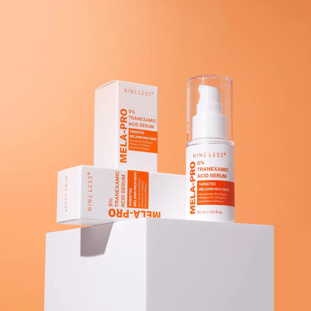 NINE LESS MELA-PRO 5% Tranexamic Acid Serum 30 ml avec emballage, sérum éclatant contre les taches pigmentaires et le teint irrégulier.