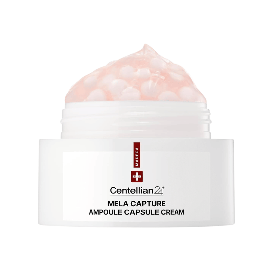 Gros plan de Centellian24 Madeca Mela Capture Ampoule Capsule Cream montrant la crème-gel rose avec des billes d’ampoule encapsulées dans le pot.