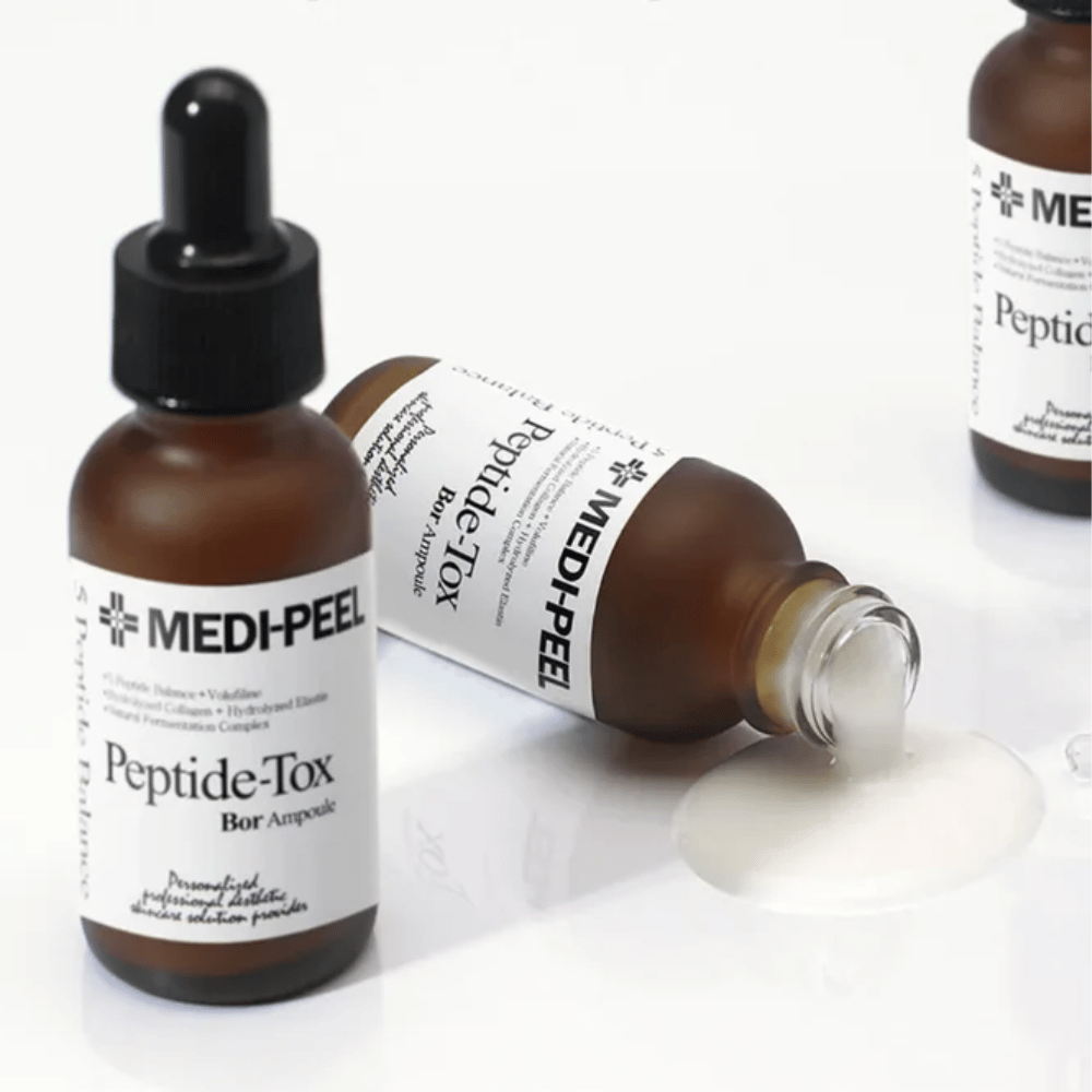 MEDI-PEEL Peptide-Tox Bor Ampoule avec texture de sérum visible – sérum anti-âge avec complexe de peptides qui offre une élasticité accrue, une peau repulpée et une texture de peau plus uniforme.