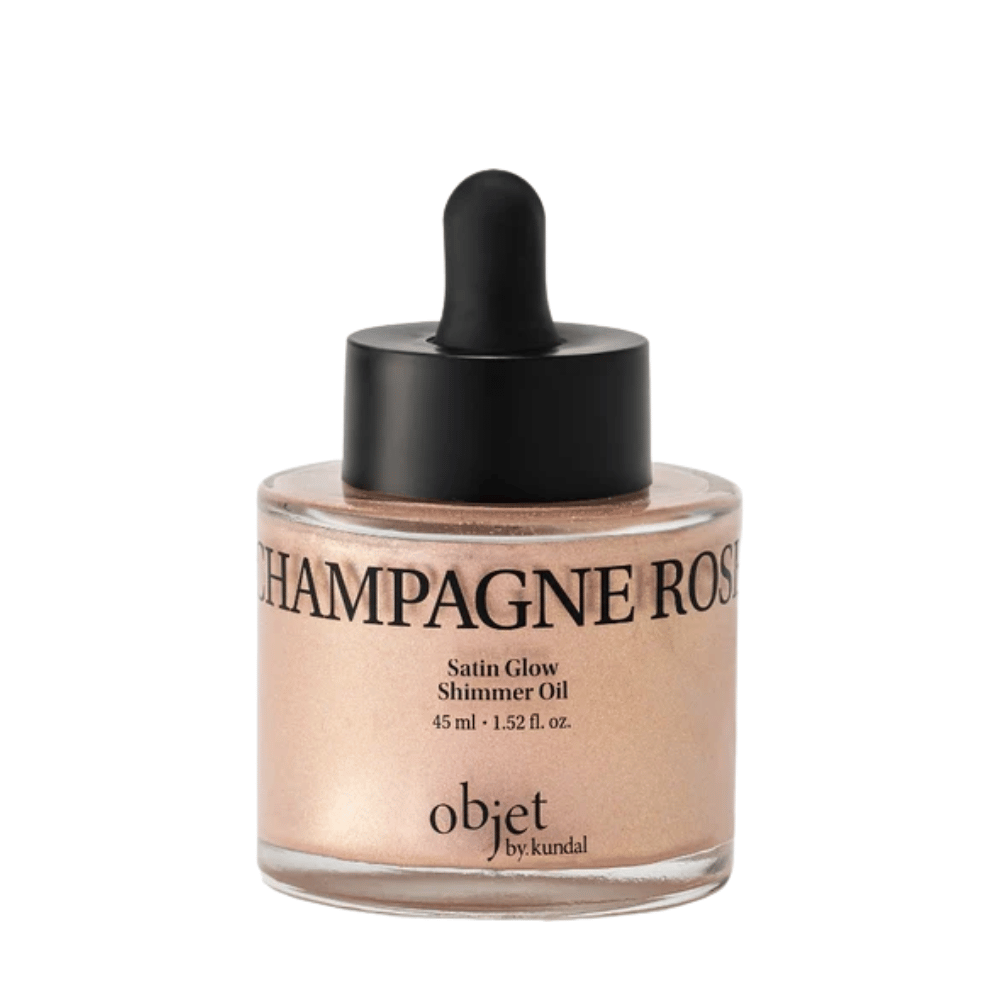 Objet by KUNDAL Satin Glow Shimmer Oil Champagne Rose 45 ml – huile corporelle illuminatrice avec une finition délicatement scintillante or rose.
