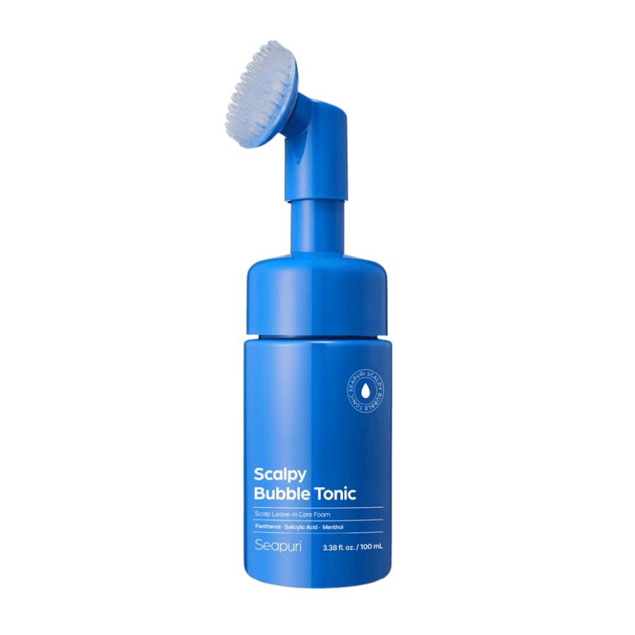 Image produit détourée de Seapuri Scalpy Bubble Tonic montrant le flacon bleu avec brosse en silicone intégrée pour une application facile et hygiénique directement sur le cuir chevelu.