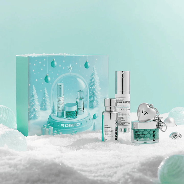 Coffret cadeau de VT Cosmetics avec les produits de la série PDRN dans un design de boule à neige de Noël – parfait comme cadeau.