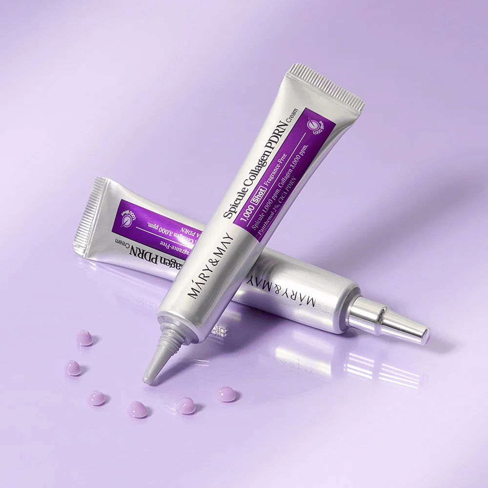 Mary & May Spicule Collagen PDRN Cream en plusieurs tubes sur fond violet, crème visage intensément reconstructeur avec technologie spicule et collagène.
