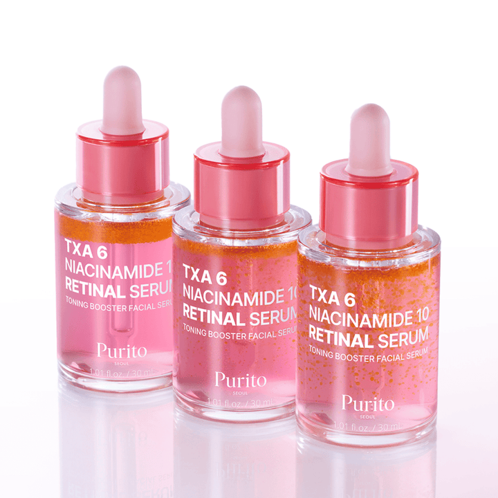 Tre flaskor av Purito TXA 6 Niacinamide 10 Retinal Serum. Ett lystergivande och jämnande ansiktsserum med anti-aging-effekt.